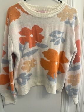 Pink lily women’s medium floral sweater